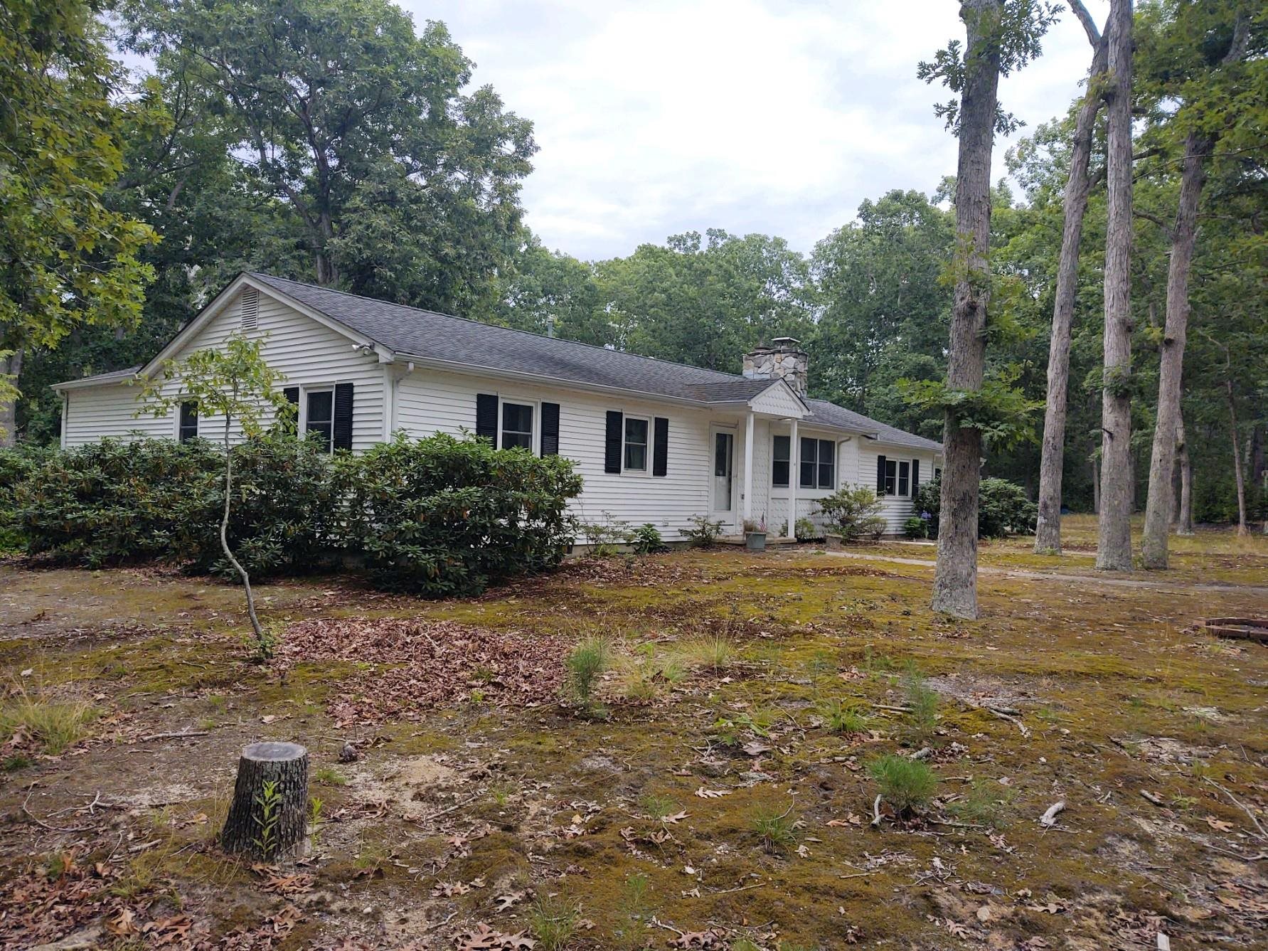 13 Sleepy Hollow Road Marmora, NJ 08223 - Photo 1 of 1 a front view of a house with a yard