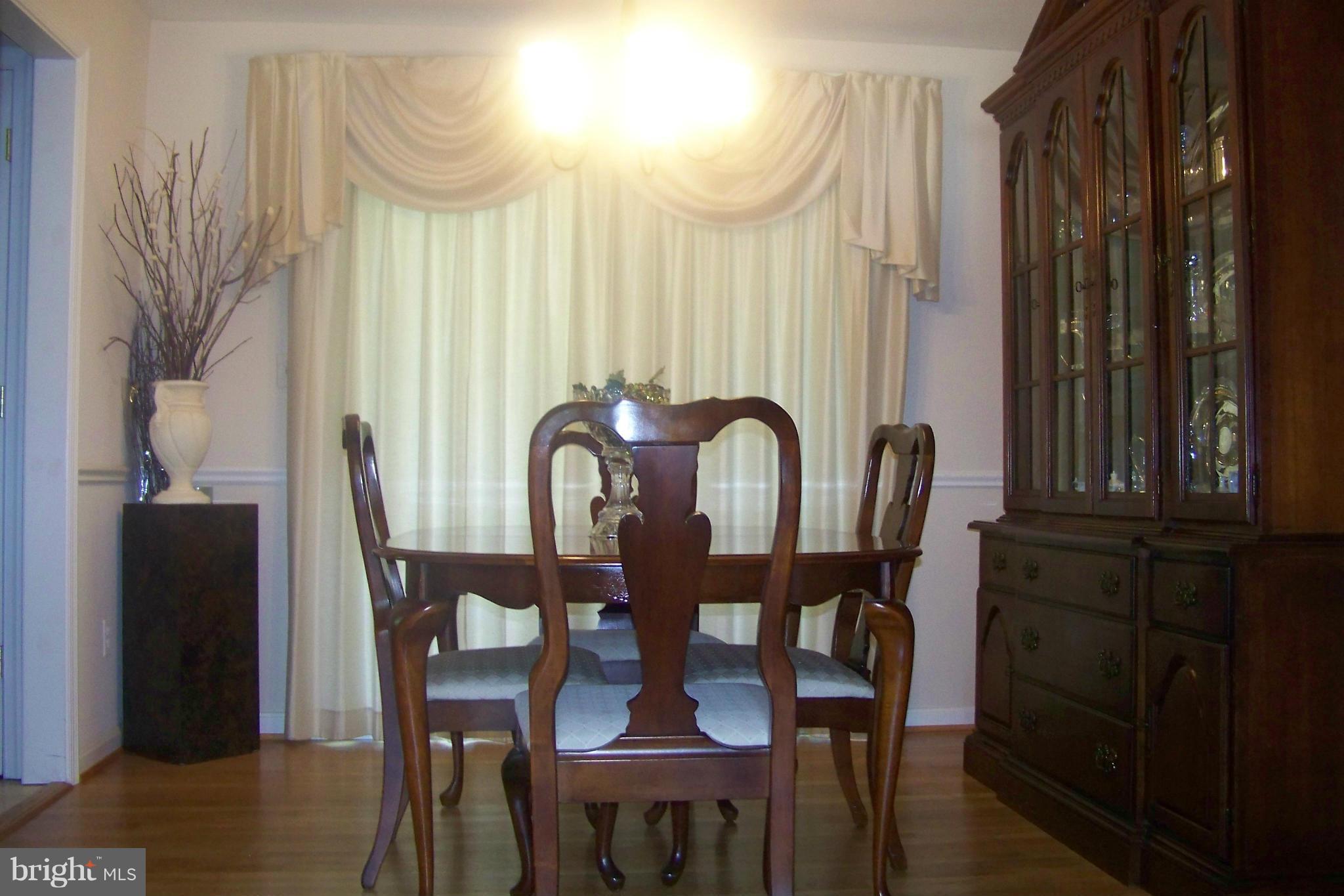 90 Circle Road Pasadena, MD 21122 - Photo 13 of 21 Dining Room w/wood Floors