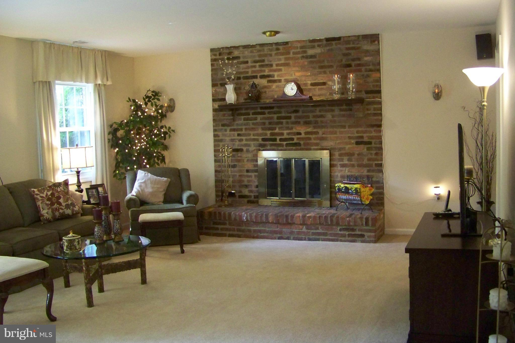 90 Circle Road Pasadena, MD 21122 - Photo 17 of 21 Family Room w/Brick Fireplace