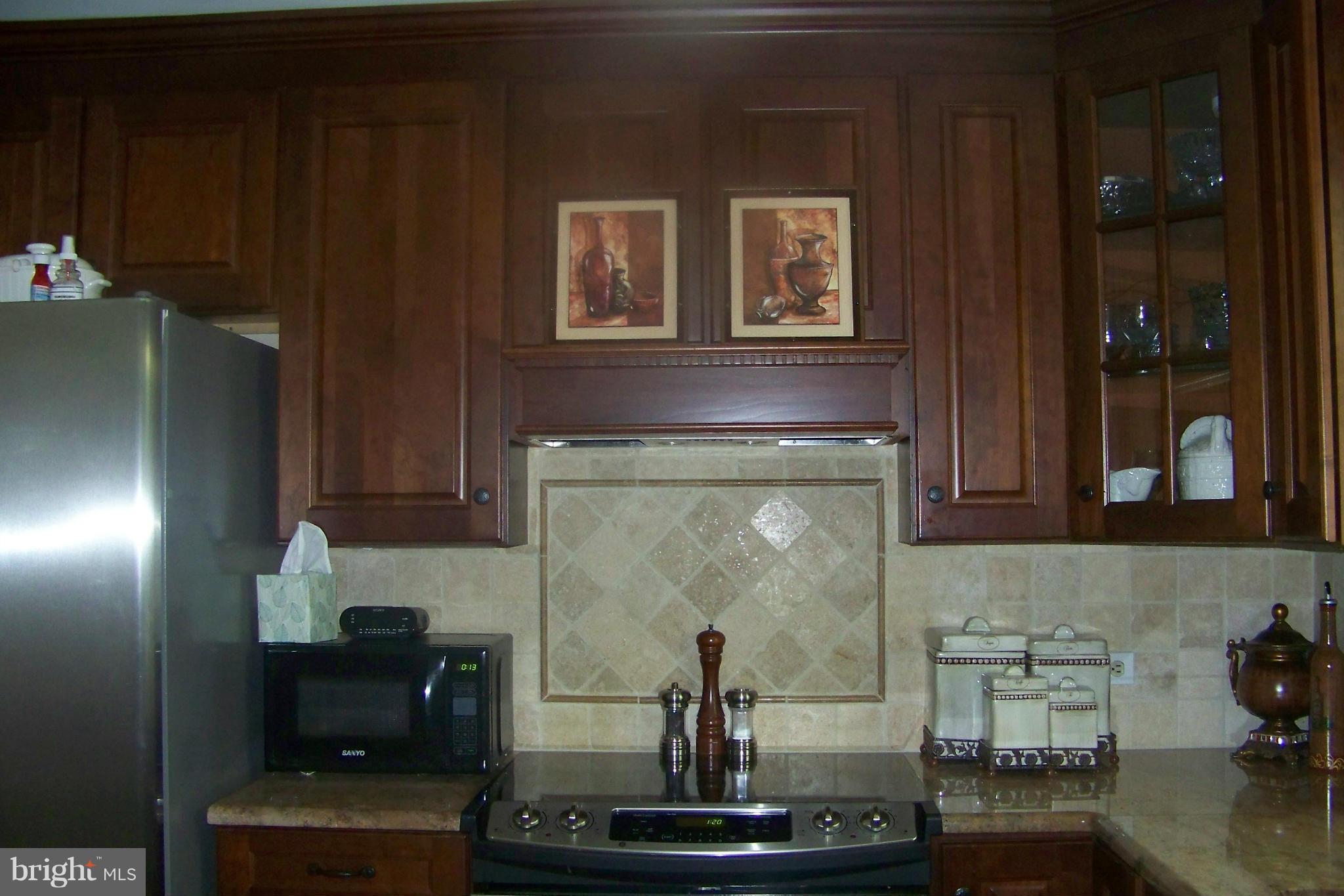 90 Circle Road Pasadena, MD 21122 - Photo 8 of 21 Detail of Kitchen Tile Work