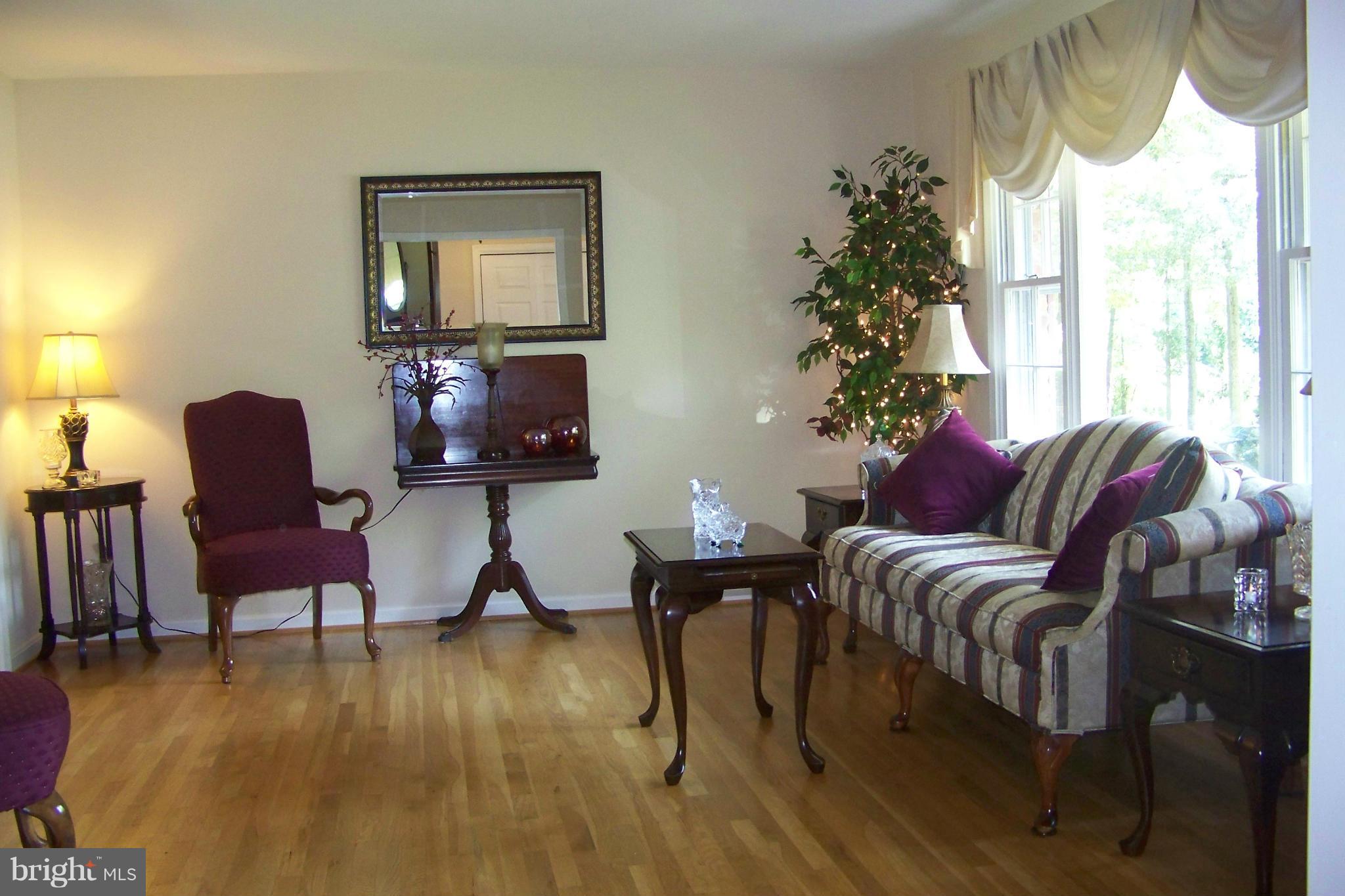 90 Circle Road Pasadena, MD 21122 - Photo 10 of 21 Living Room w/Wood Floors
