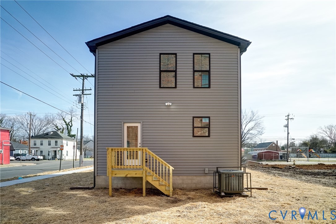 901 Commerce Street Petersburg, VA 23803 - Photo 40 of 40 a view of a house with a yard