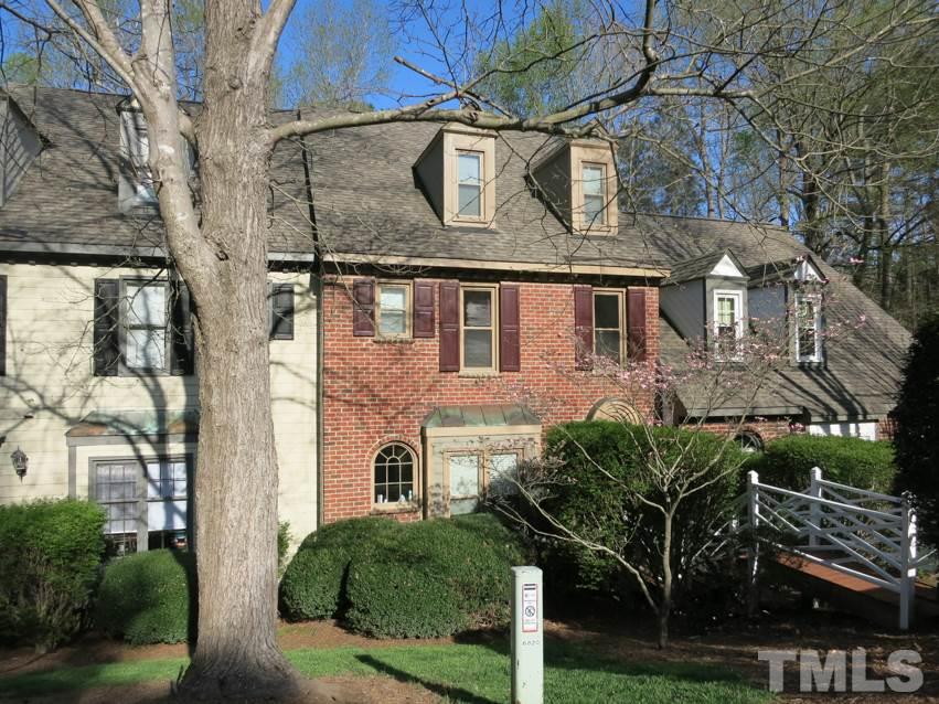 6820 Gloucester Road Raleigh, NC 27612 - Photo 1 of 25 a front view of a house with garden