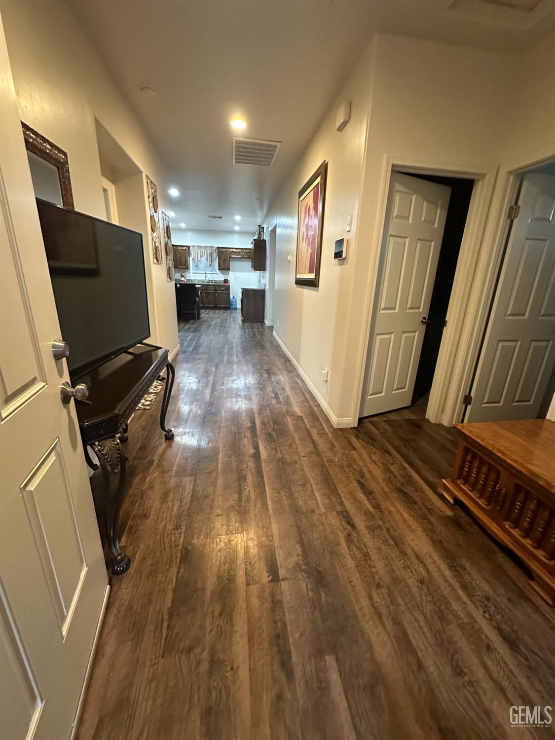 Undisclosed Address Wasco, CA 93280 - Photo 2 of 24 a view of a living room with furniture and a flat screen tv