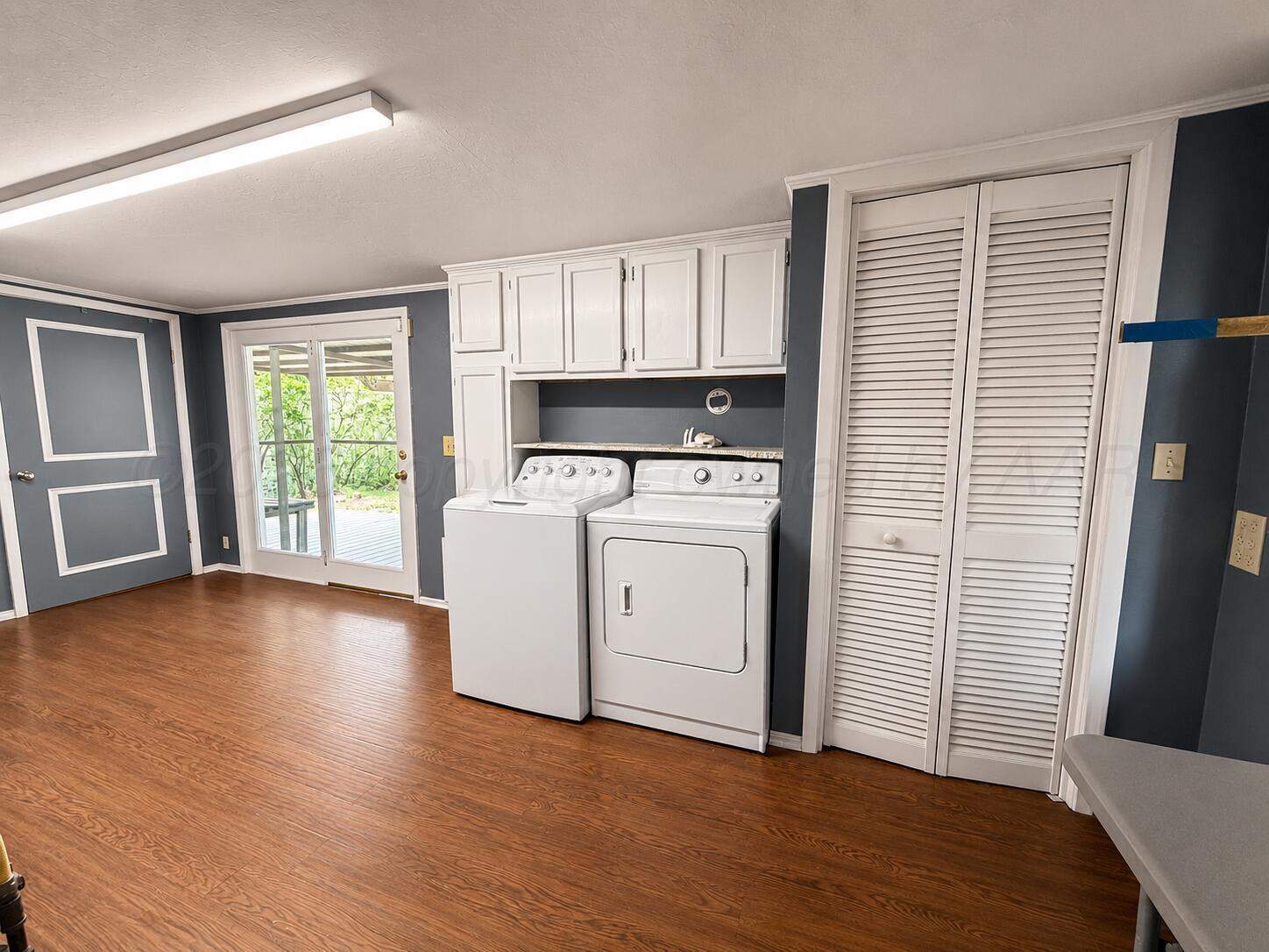 606 South Prospect Street Amarillo, TX 79106 - Photo 14 of 22 a view of a kitchen with wooden floor and electronic appliances