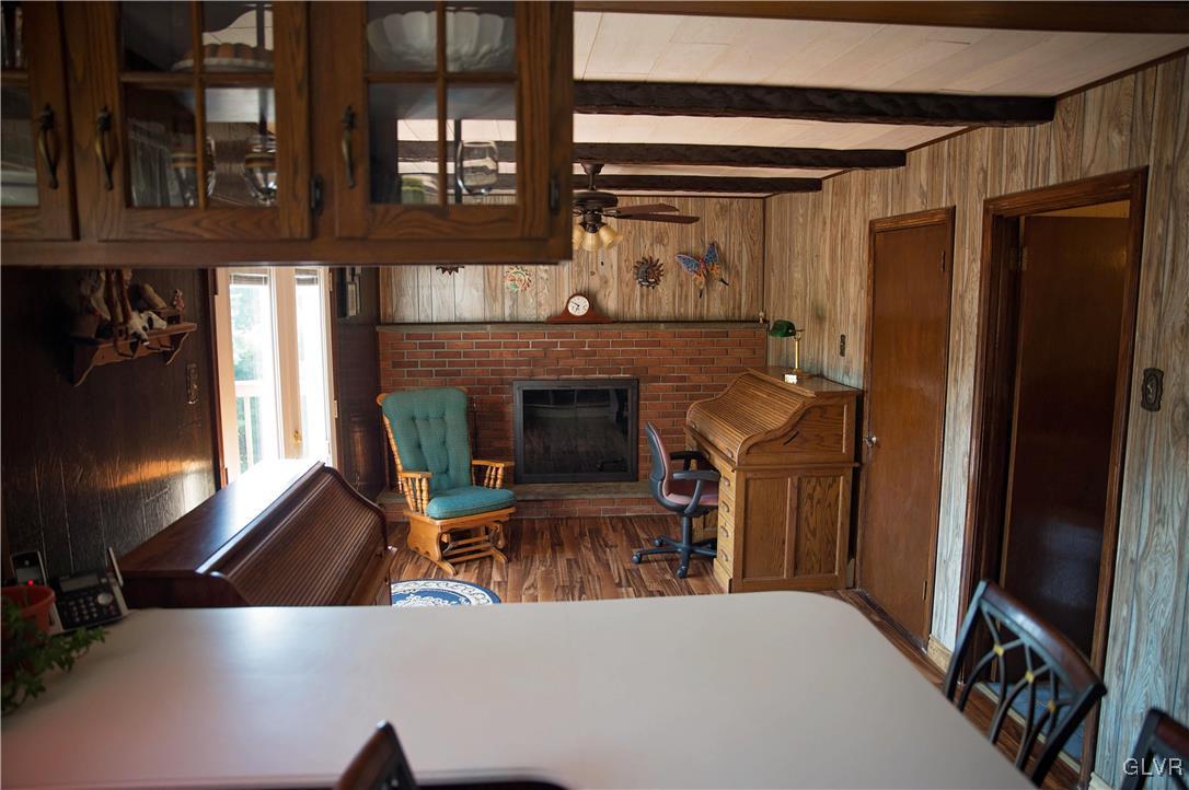 306 Deer Run Road Bechtelsville, PA 19505 - Photo 6 of 29 Family room with brick fireplace, wood floors and