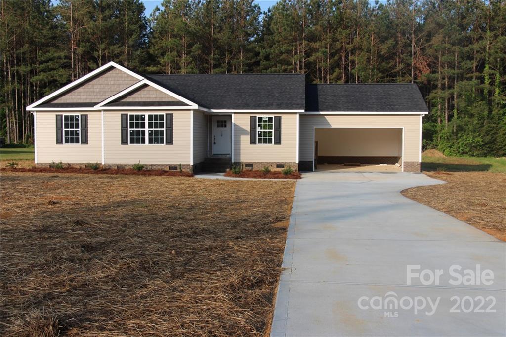 4256 Fletcher Funderburk Road Lancaster, SC 29720 - Photo 1 of 18 a front view of a house with a yard