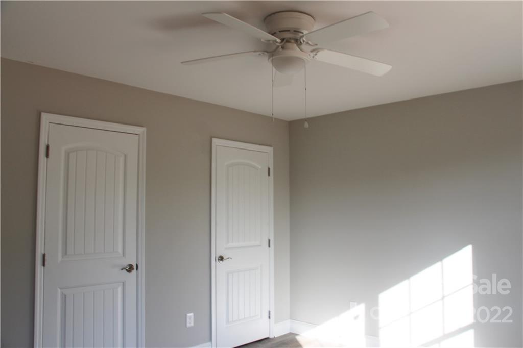 4256 Fletcher Funderburk Road Lancaster, SC 29720 - Photo 12 of 18 a view of a chandelier fan in a room