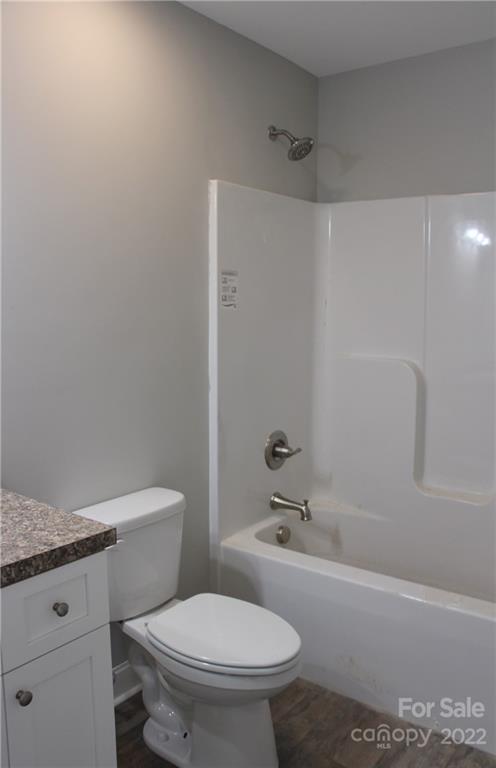 4256 Fletcher Funderburk Road Lancaster, SC 29720 - Photo 15 of 18 a white toilet sitting next to a bath tub