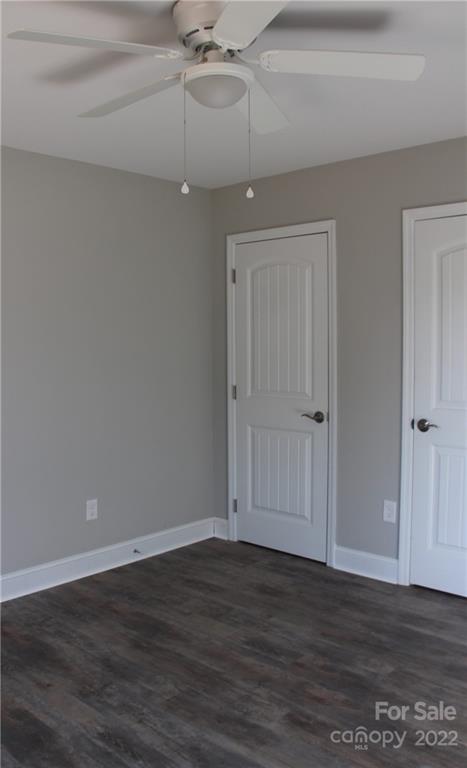 4256 Fletcher Funderburk Road Lancaster, SC 29720 - Photo 17 of 18 a view of an empty room with wooden floor
