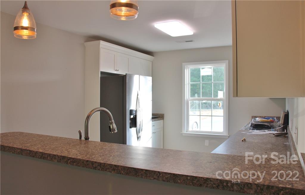 4256 Fletcher Funderburk Road Lancaster, SC 29720 - Photo 4 of 18 a view of a kitchen with a sink and a window