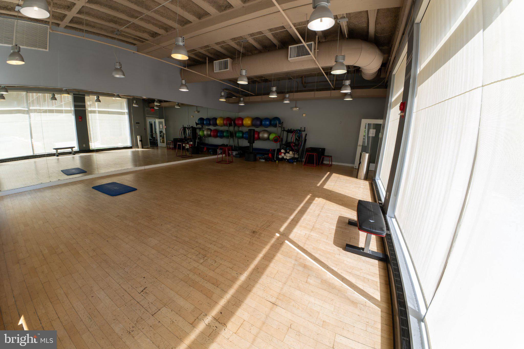 800 4th Street Southwest, Unit N107 Washington, DC 20024 - Photo 39 of 52 Spacious fitness studio with natural light.