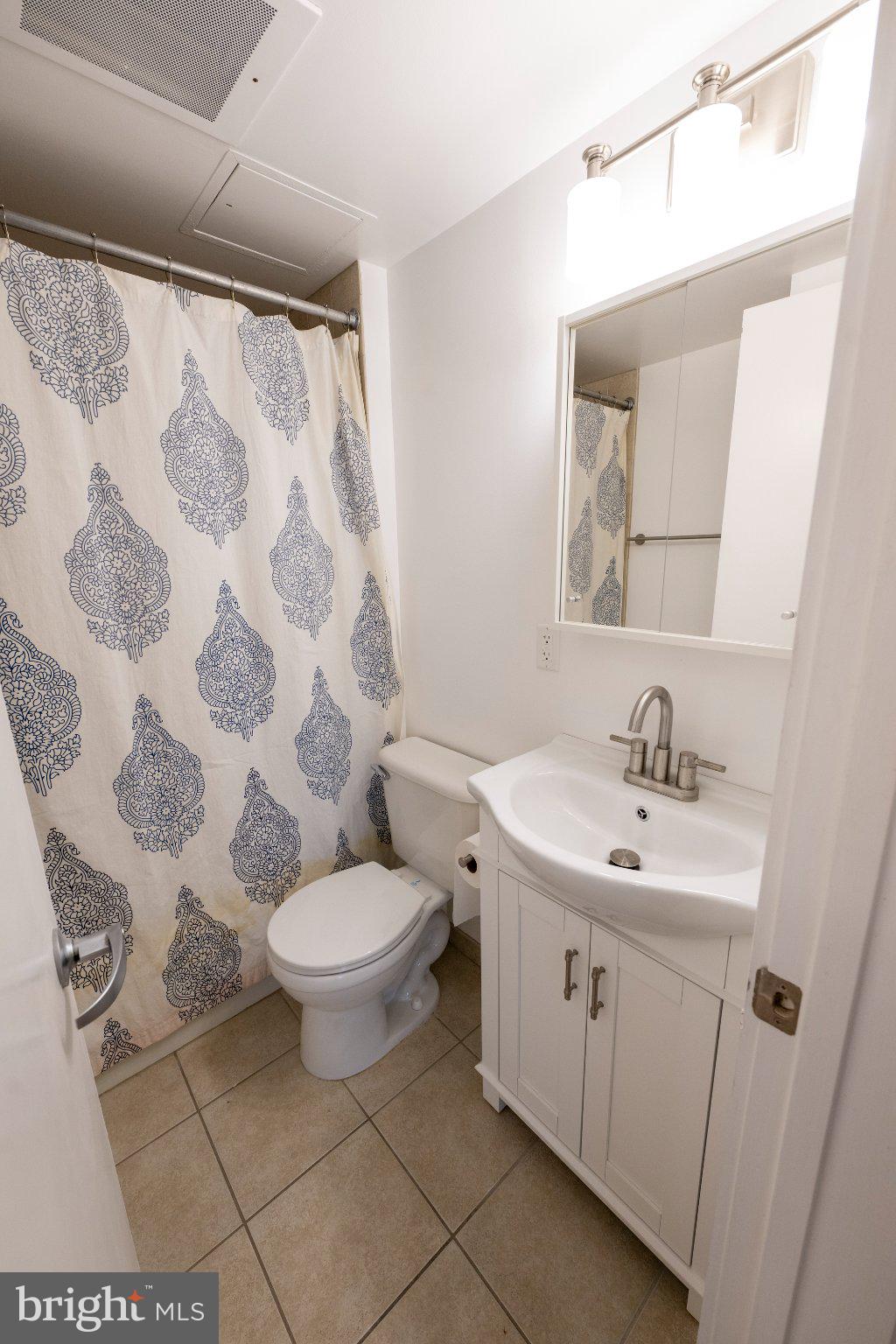 800 4th Street Southwest, Unit N107 Washington, DC 20024 - Photo 4 of 52 Charming bathroom with modern touches.