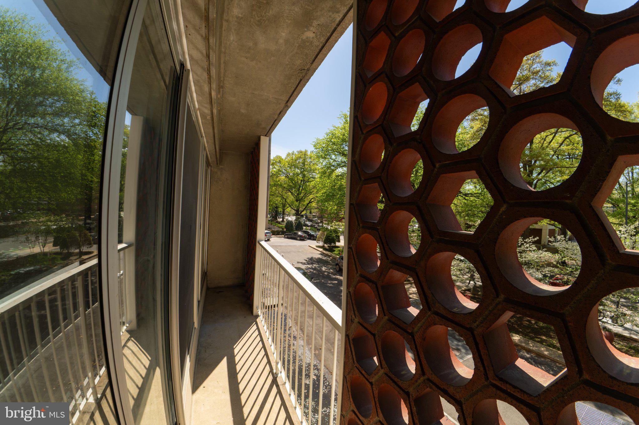800 4th Street Southwest, Unit N107 Washington, DC 20024 - Photo 44 of 52 Modern balcony with vibrant views.