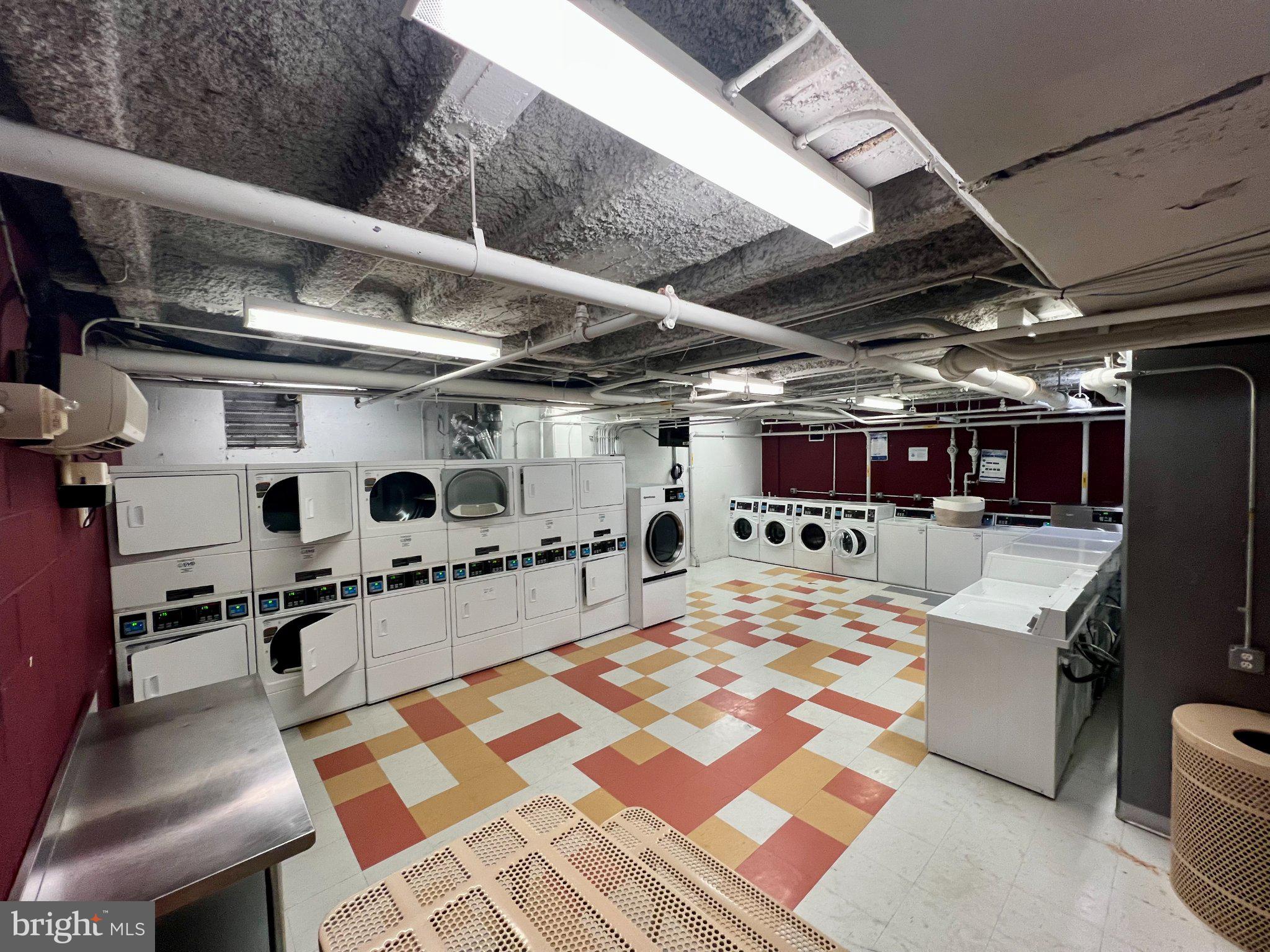 800 4th Street Southwest, Unit N107 Washington, DC 20024 - Photo 51 of 52 Bright and spacious laundry facility.