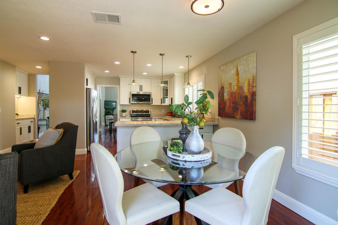 4240 Briarglen Drive San Jose, CA 95118 - Photo 17 of 42 a view of a dining room with furniture and a window