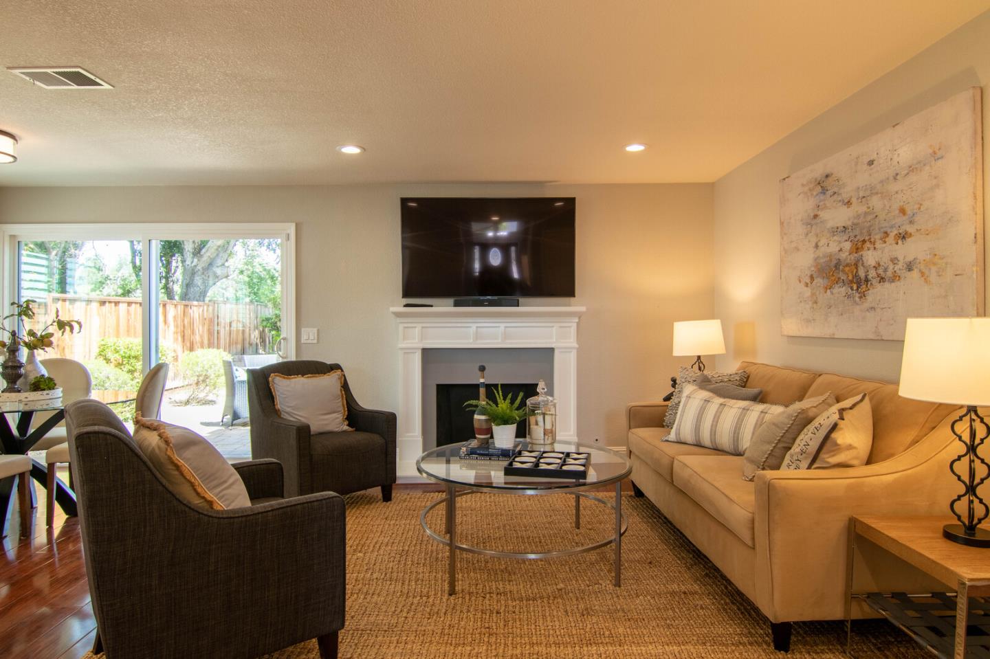 4240 Briarglen Drive San Jose, CA 95118 - Photo 20 of 42 a living room with furniture a fireplace and a flat screen tv