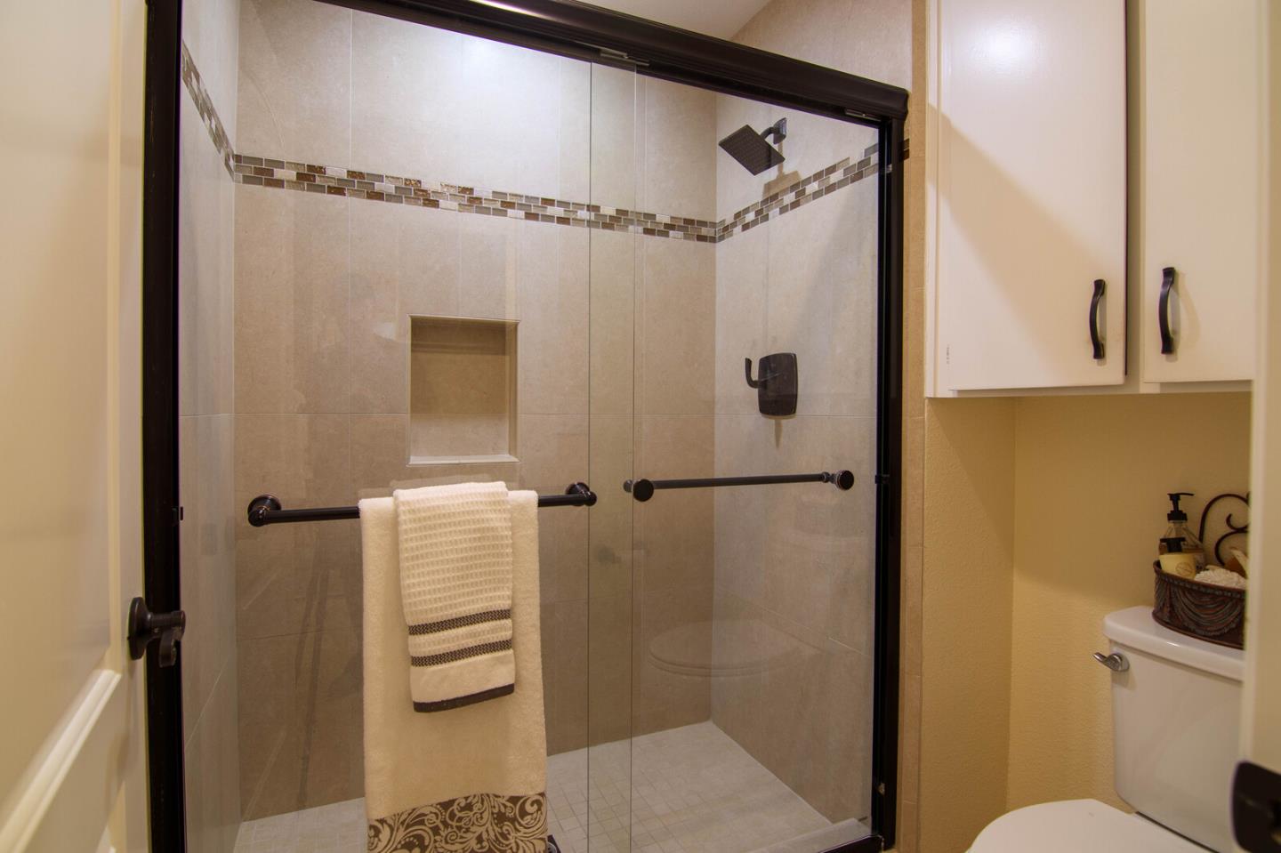 4240 Briarglen Drive San Jose, CA 95118 - Photo 28 of 42 a bathroom with a shower and a toilet