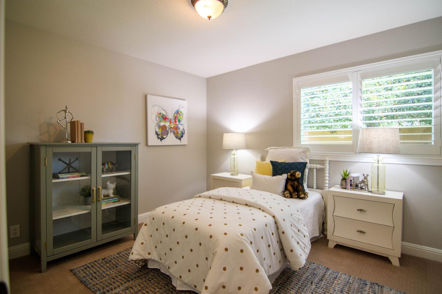 4240 Briarglen Drive San Jose, CA 95118 - Photo 32 of 42 a bed room with a bed and a window