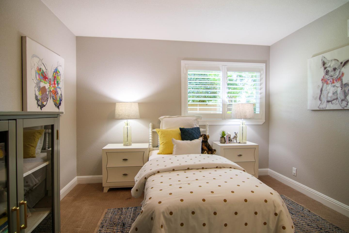 4240 Briarglen Drive San Jose, CA 95118 - Photo 33 of 42 a bedroom with a bed a wall painting and a window