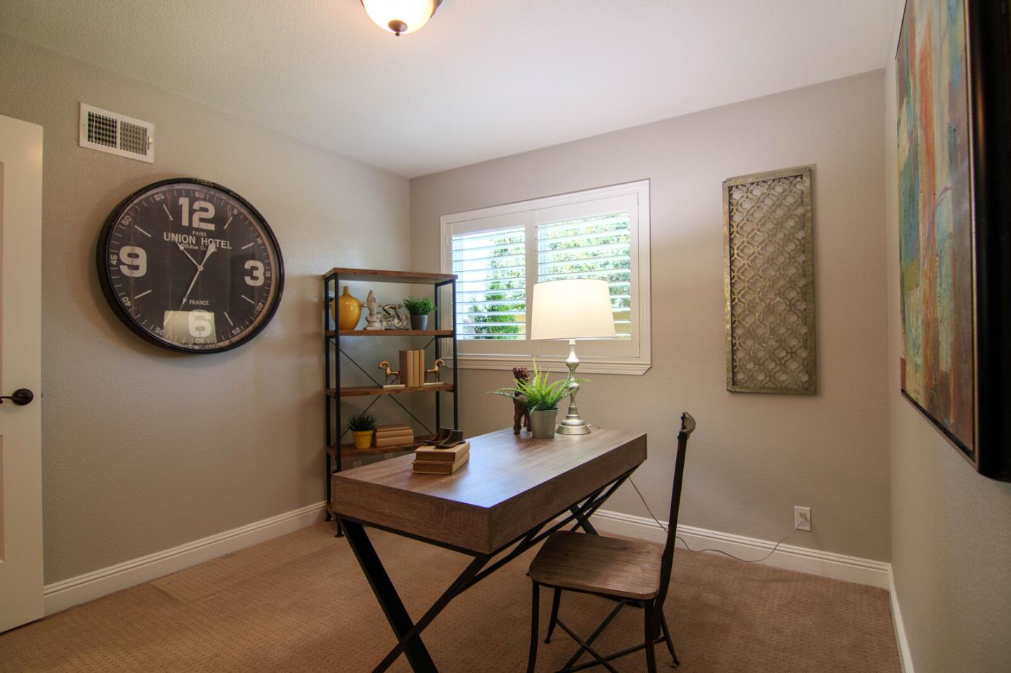 4240 Briarglen Drive San Jose, CA 95118 - Photo 36 of 42 a view of a dining room with a table and a chair