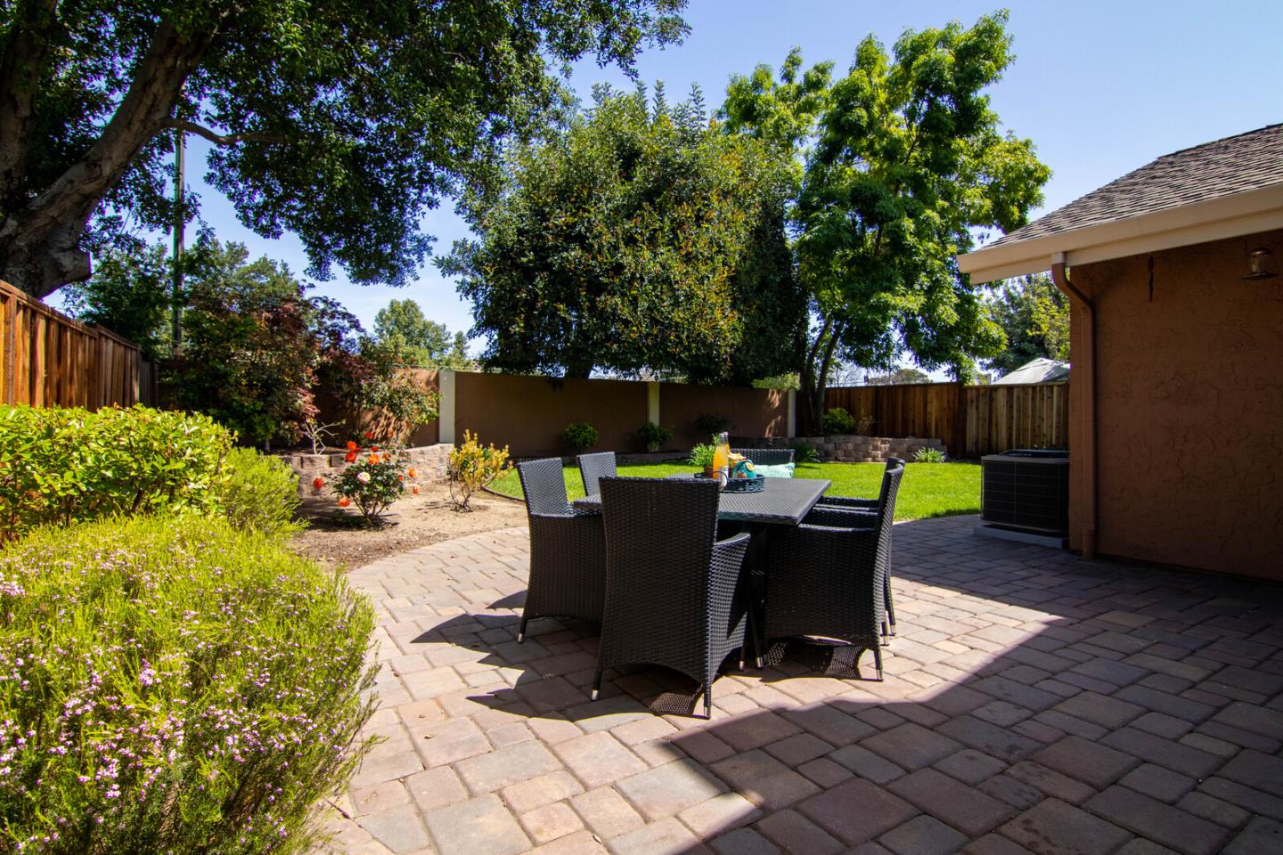 4240 Briarglen Drive San Jose, CA 95118 - Photo 38 of 42 a view of a chair and table in backyard of the house