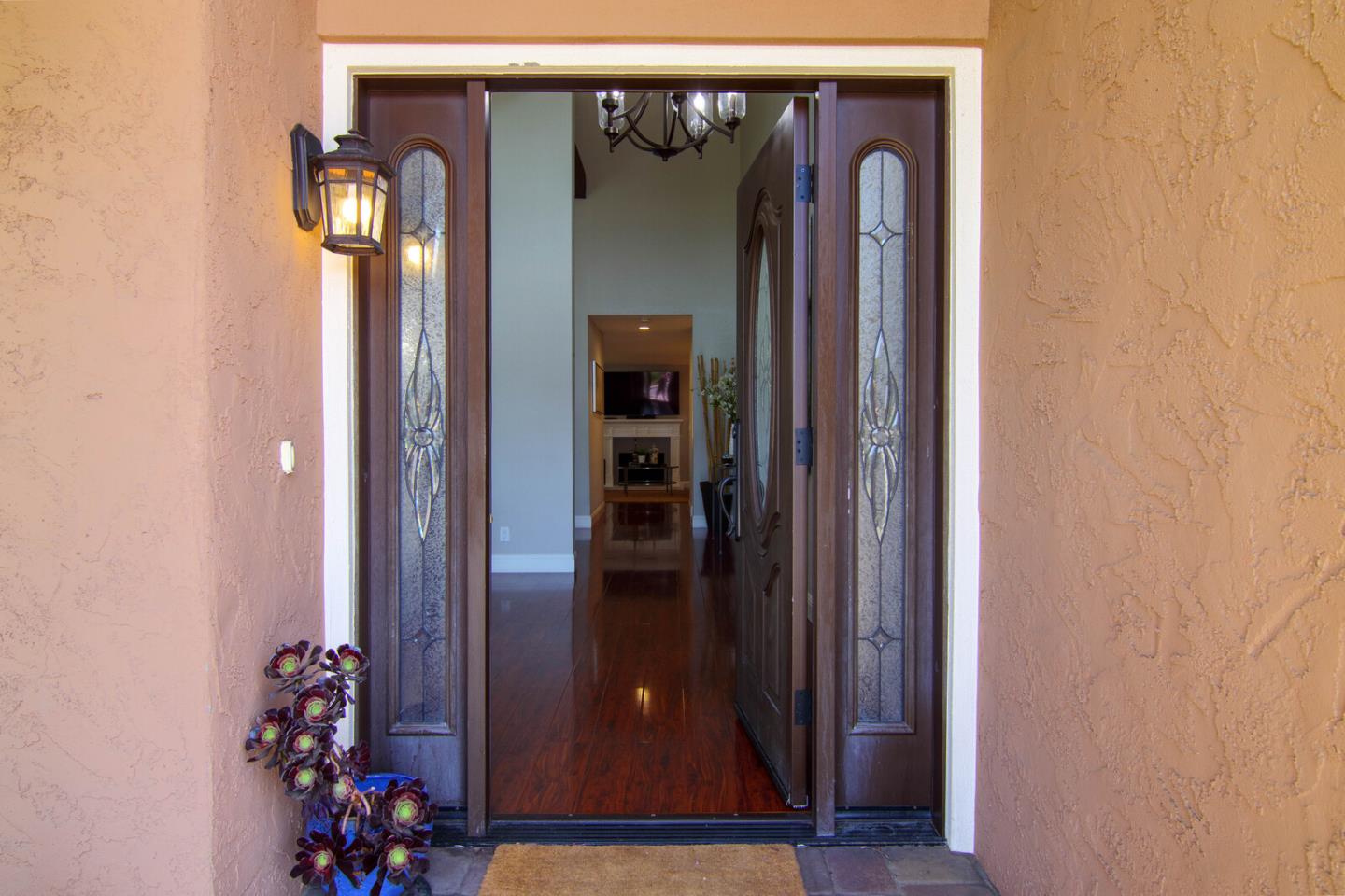 4240 Briarglen Drive San Jose, CA 95118 - Photo 5 of 42 wooden door with a mirror