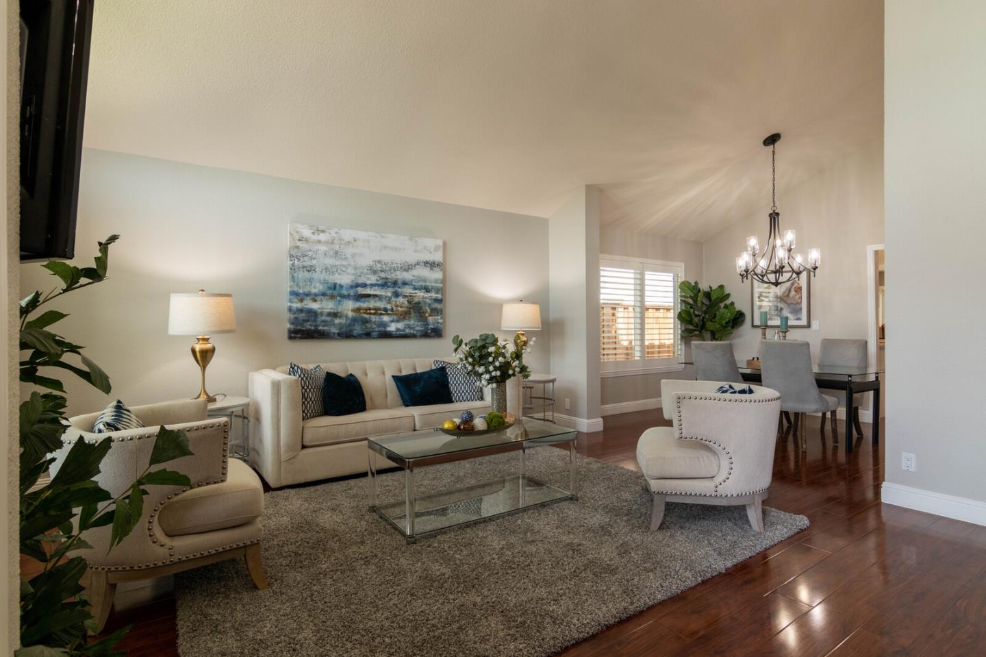 4240 Briarglen Drive San Jose, CA 95118 - Photo 6 of 42 a living room with furniture and a flat screen tv