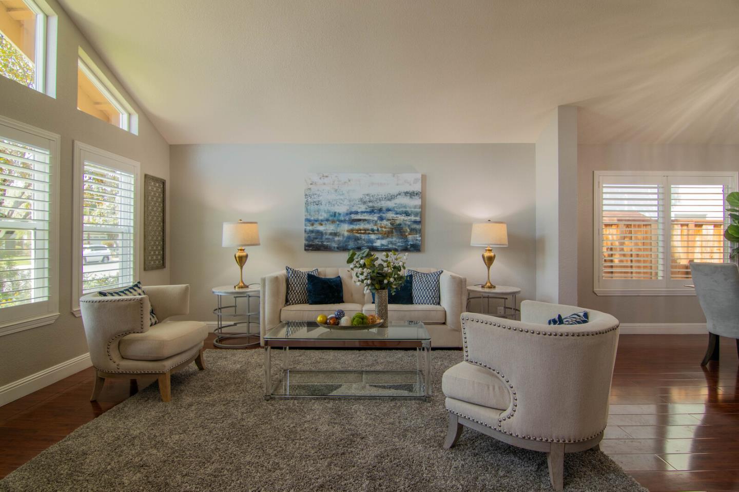 4240 Briarglen Drive San Jose, CA 95118 - Photo 7 of 42 a living room with furniture a rug potted plant and a large window