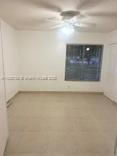 a view of a room with an empty space