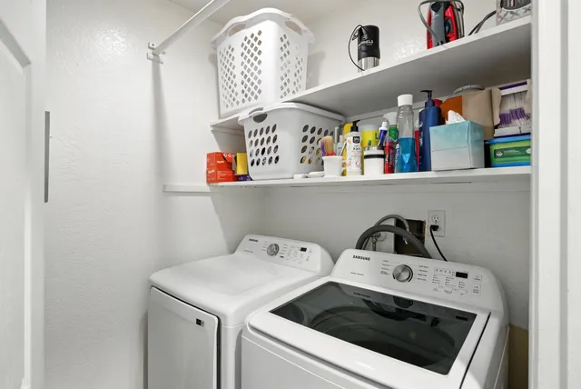 a utility room with dryer and washer