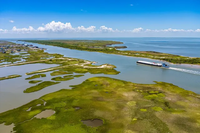 a view of an ocean and city