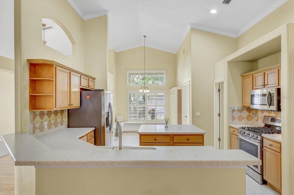 15129 Shearcrest Drive Lithia, FL 33547 - Photo 17 of 48 a large spacious bathroom with a granite countertop double vanity sink a mirror and a bathtub