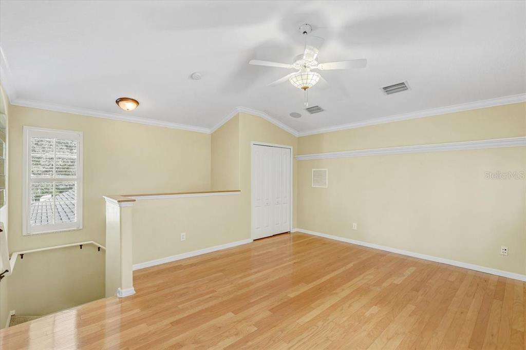15129 Shearcrest Drive Lithia, FL 33547 - Photo 37 of 48 an empty room with windows and fan