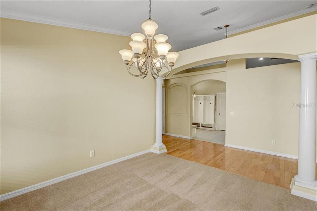 15129 Shearcrest Drive Lithia, FL 33547 - Photo 9 of 48 a view of an empty room with a chandelier fan