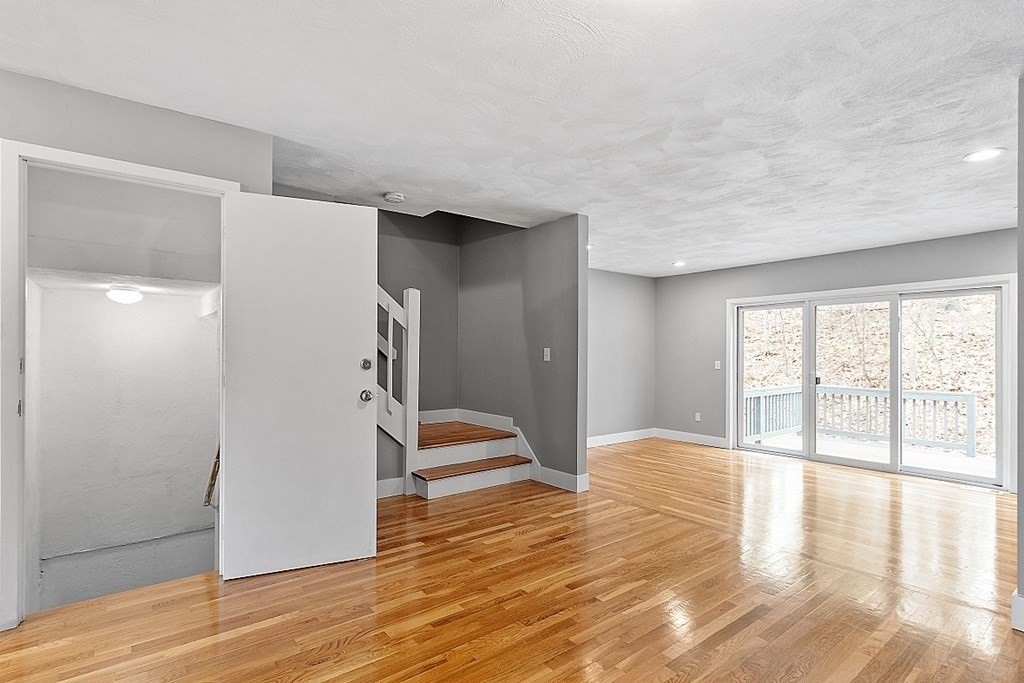 31 Blithewood Avenue, Unit 705 Worcester, MA 01604 - Photo 13 of 31 a view of an empty room with wooden floor and a window