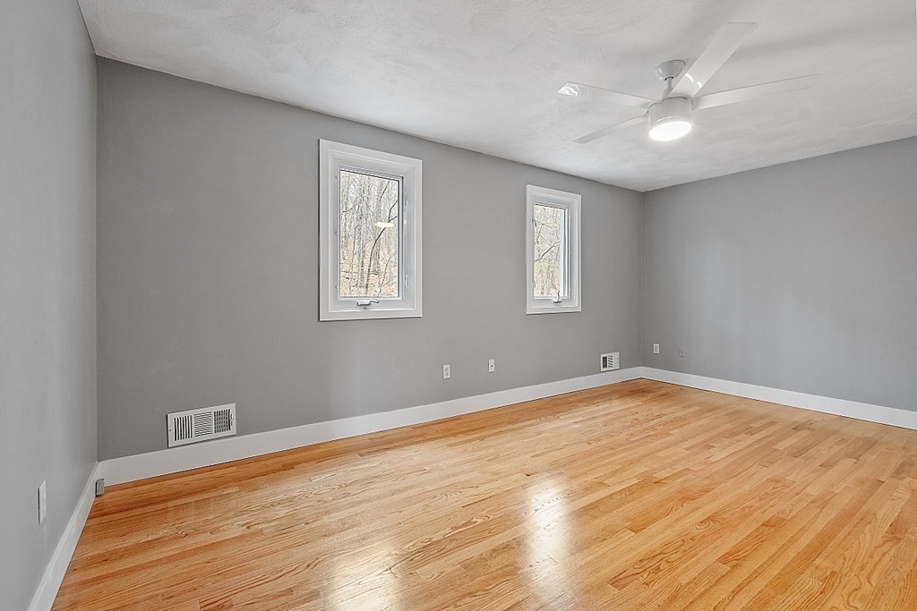 31 Blithewood Avenue, Unit 705 Worcester, MA 01604 - Photo 21 of 31 a view of empty room with wooden floor and fan