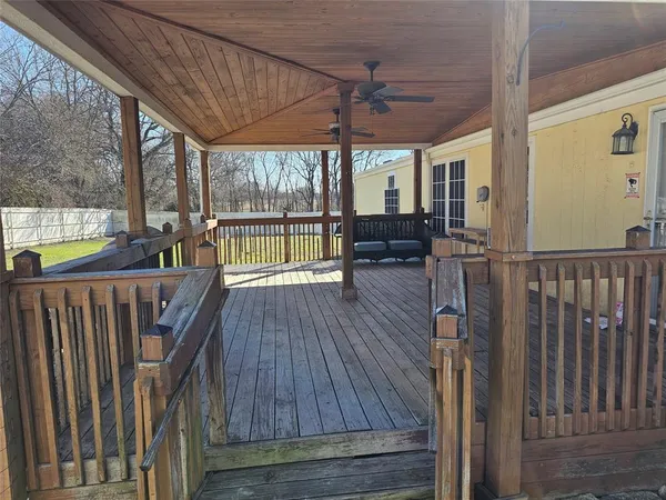 a view of porch with seating area
