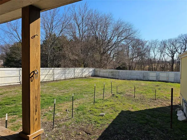 a view of swimming pool from a yard