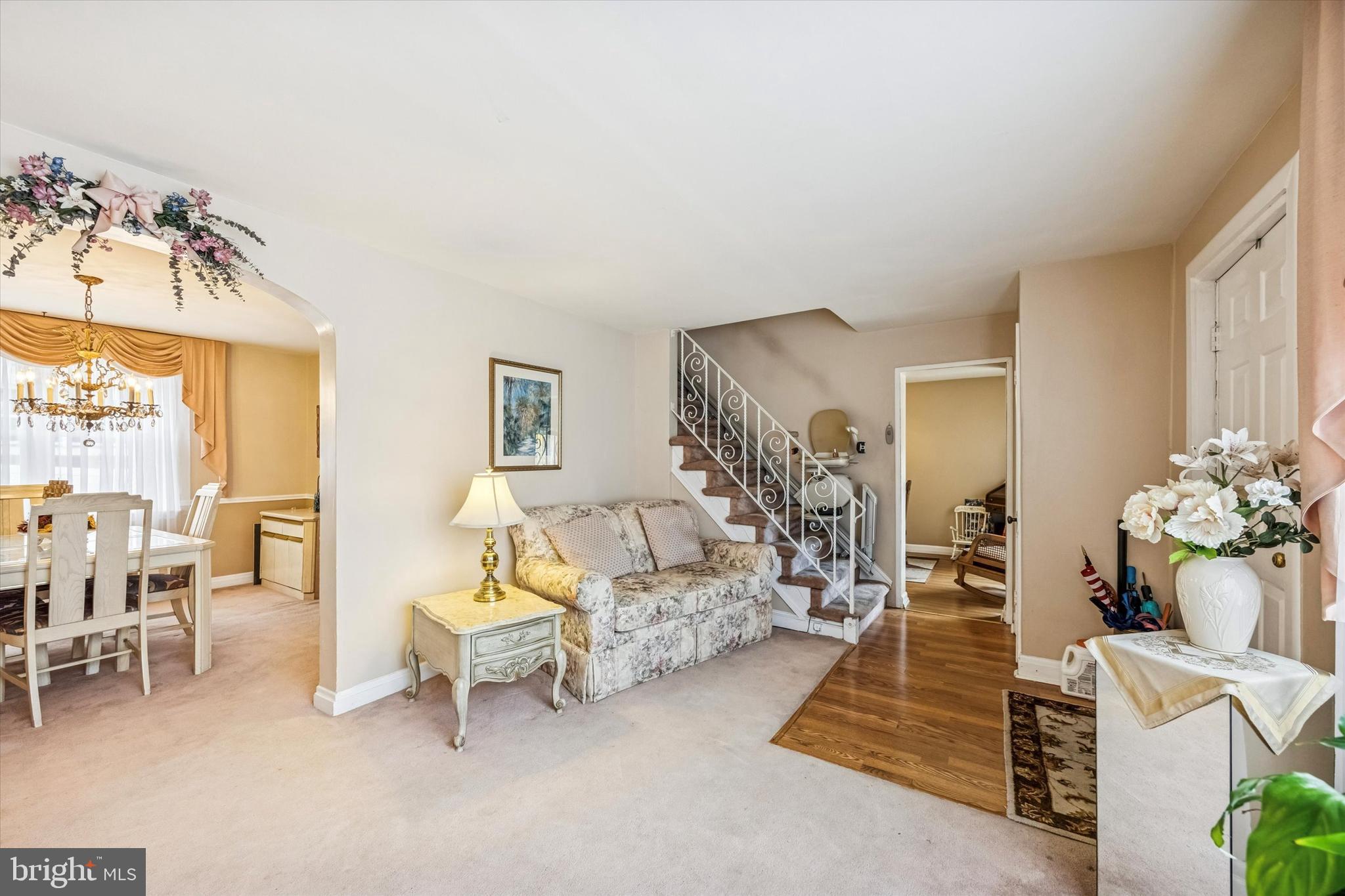 1601 Burmont Road Drexel Hill, PA 19026 - Photo 2 of 22 a living room with furniture and a chandelier