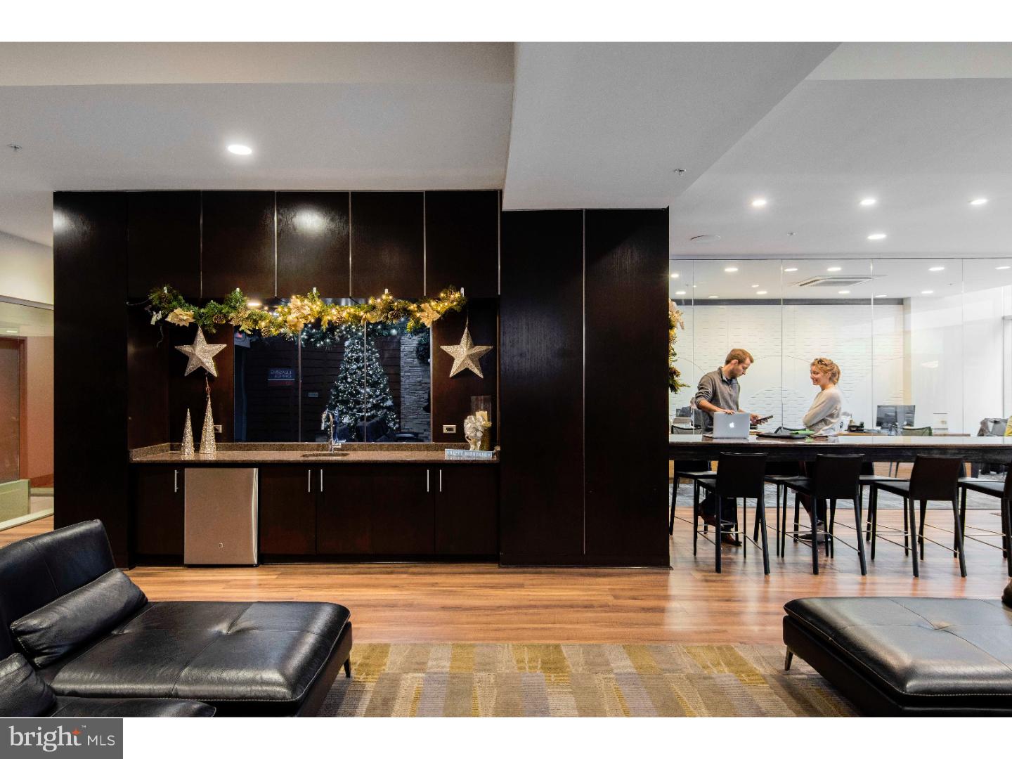 1900-20 Arch Street, Unit 413 Philadelphia, PA 19103 - Photo 26 of 30 a view of a living room and dining room