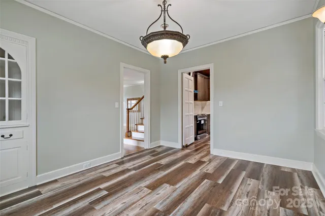 a kitchen with stainless steel appliances granite countertop a sink stove and microwave