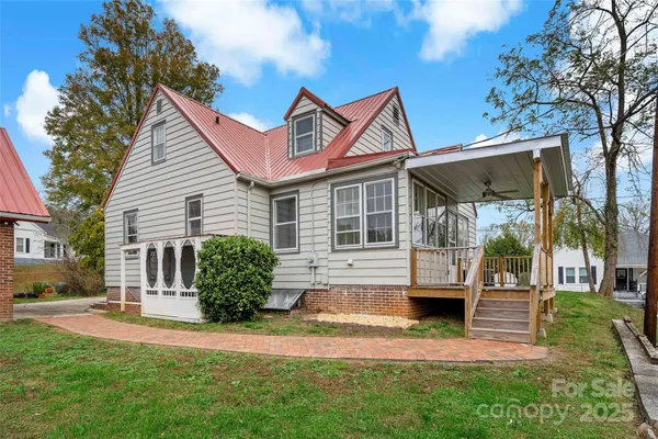 a front view of a house with yard