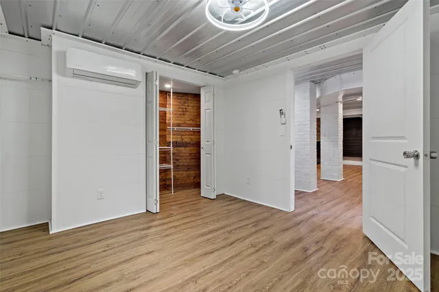 a view of a house with a patio and a yard