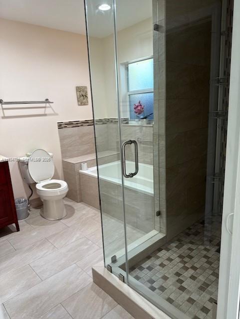 15561 Southwest 144th Terrace Miami, FL 33196 - Photo 6 of 10 a bathroom with a toilet and a shower