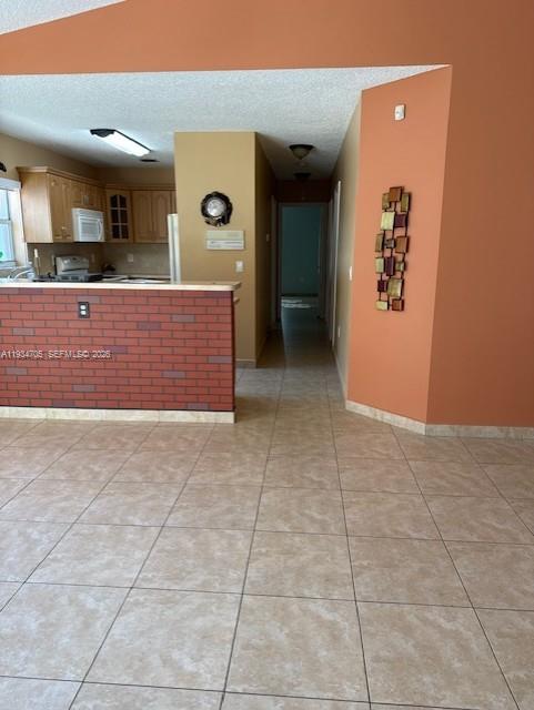 15561 Southwest 144th Terrace Miami, FL 33196 - Photo 7 of 10 a view of a hallway with entryway
