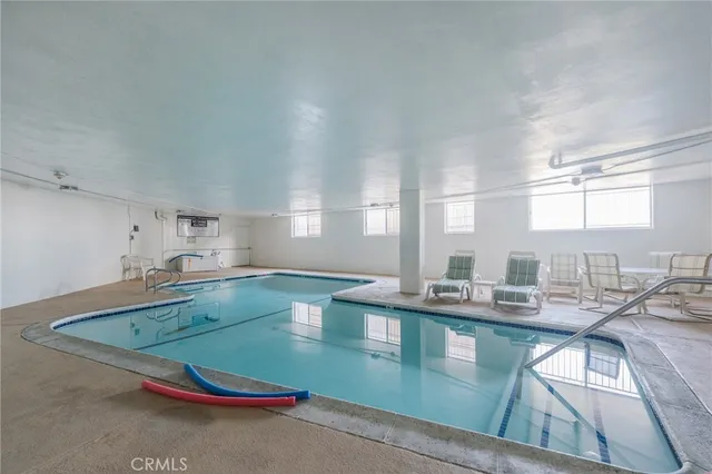 a kitchen with kitchen island granite countertop a sink and a granite counter tops
