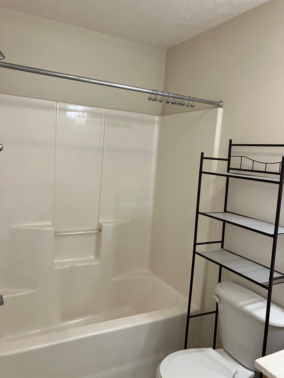 1600 Wards Ferry Road, Unit 103 Lynchburg, VA 24502 - Photo 15 of 23 a bathroom with a shower and a toilet