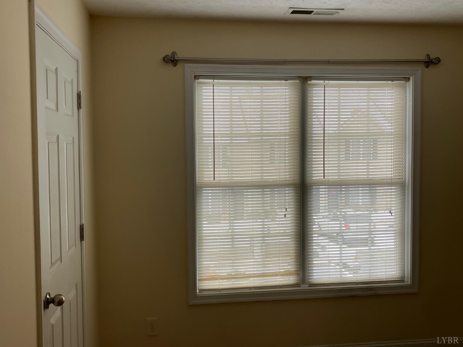 1600 Wards Ferry Road, Unit 103 Lynchburg, VA 24502 - Photo 16 of 23 a view of an empty room with a window