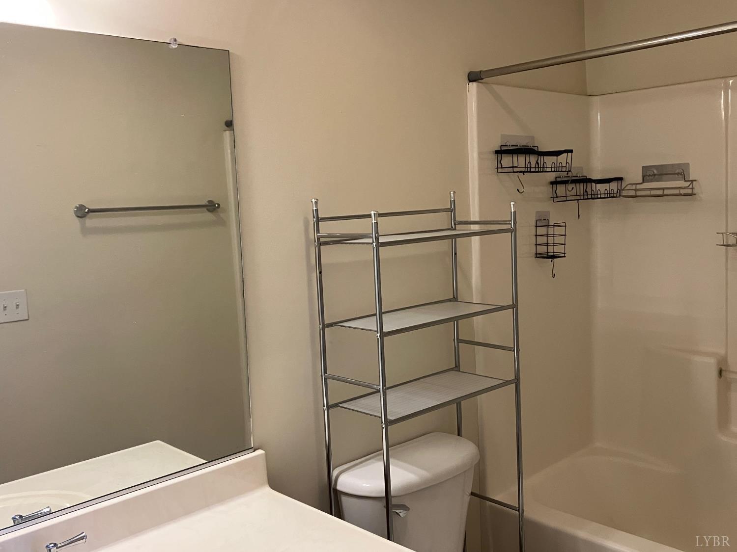 1600 Wards Ferry Road, Unit 103 Lynchburg, VA 24502 - Photo 19 of 23 a bathroom with a shower and toilet